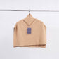 Poncho maglione in maglia a coste con collo alto