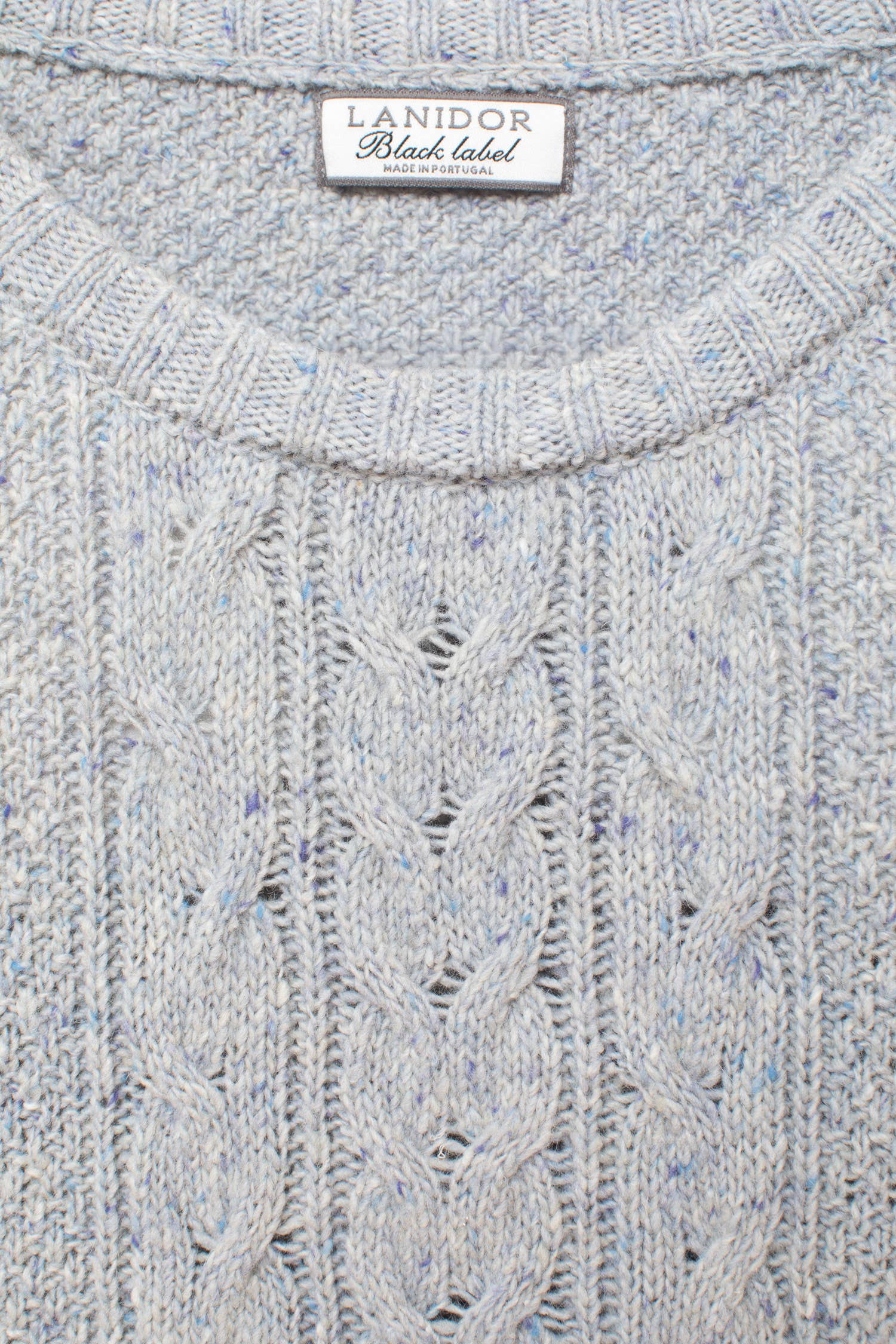 Maglione in lana con lavorazione a trecce