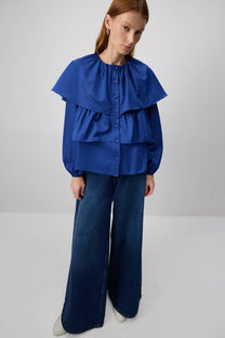 Blusa corta indaco con balze e maniche a sbuffo in cotone misto