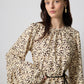 Abito lungo animalier con cintura in ecopelle