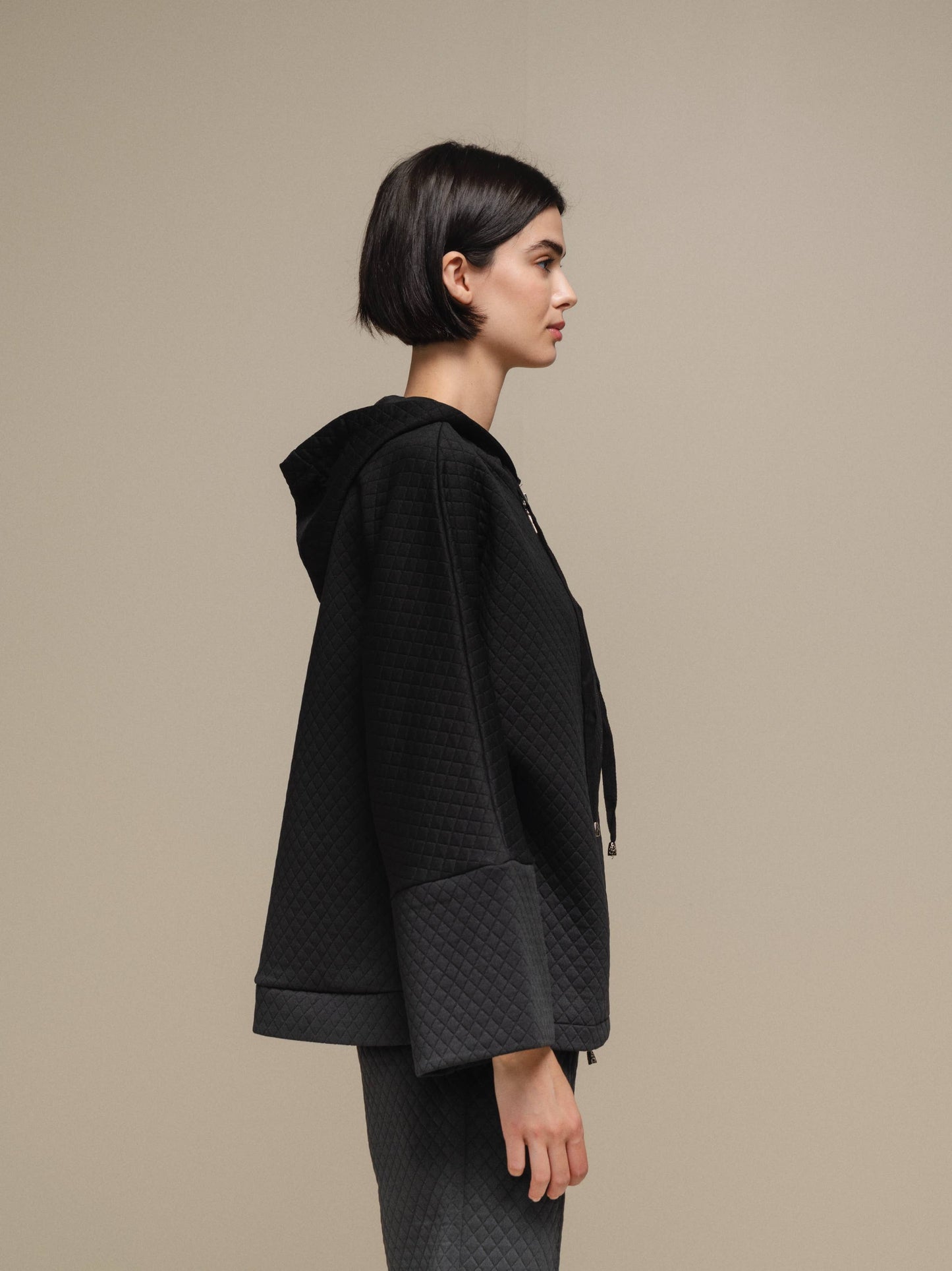Cappotto donna trapuntato con cappuccio e zip