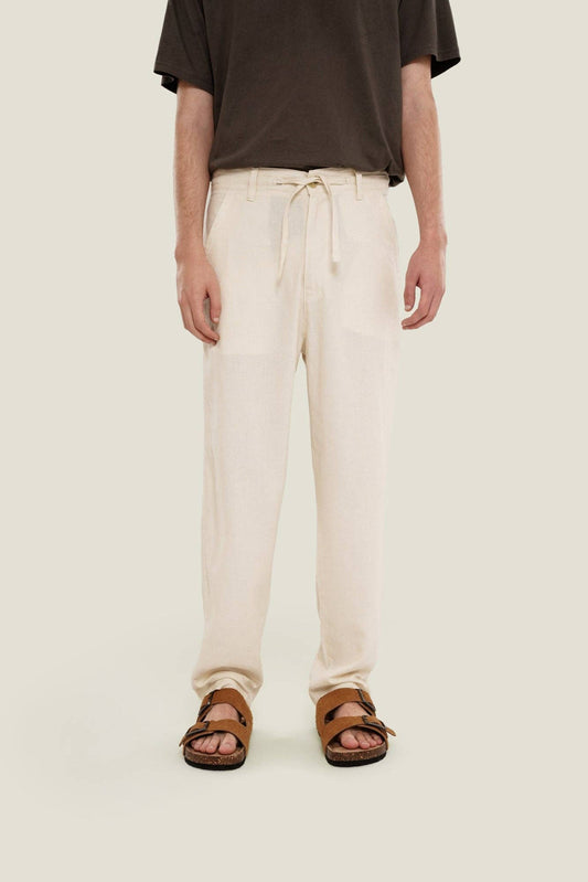 Pantaloni in lino a gamba dritta color crema