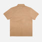 Polo essenziale in cotone organico tinta a pigmento color sabbia