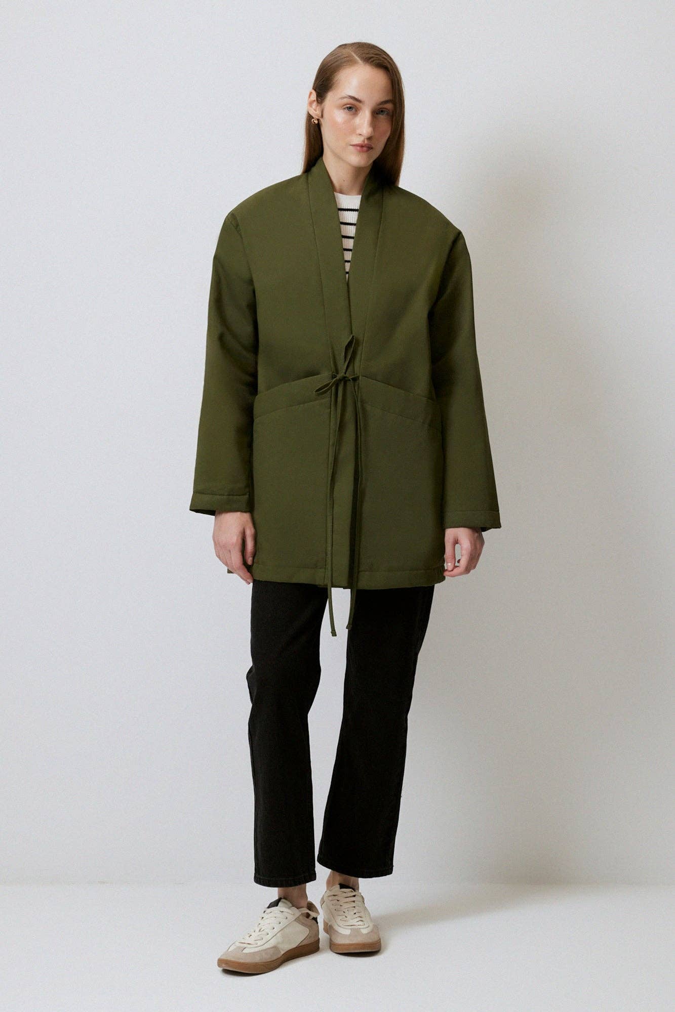 Cappotto in gabardine con tasche ampie