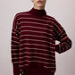 Set maglione a righe e abito midi a coste bordeaux