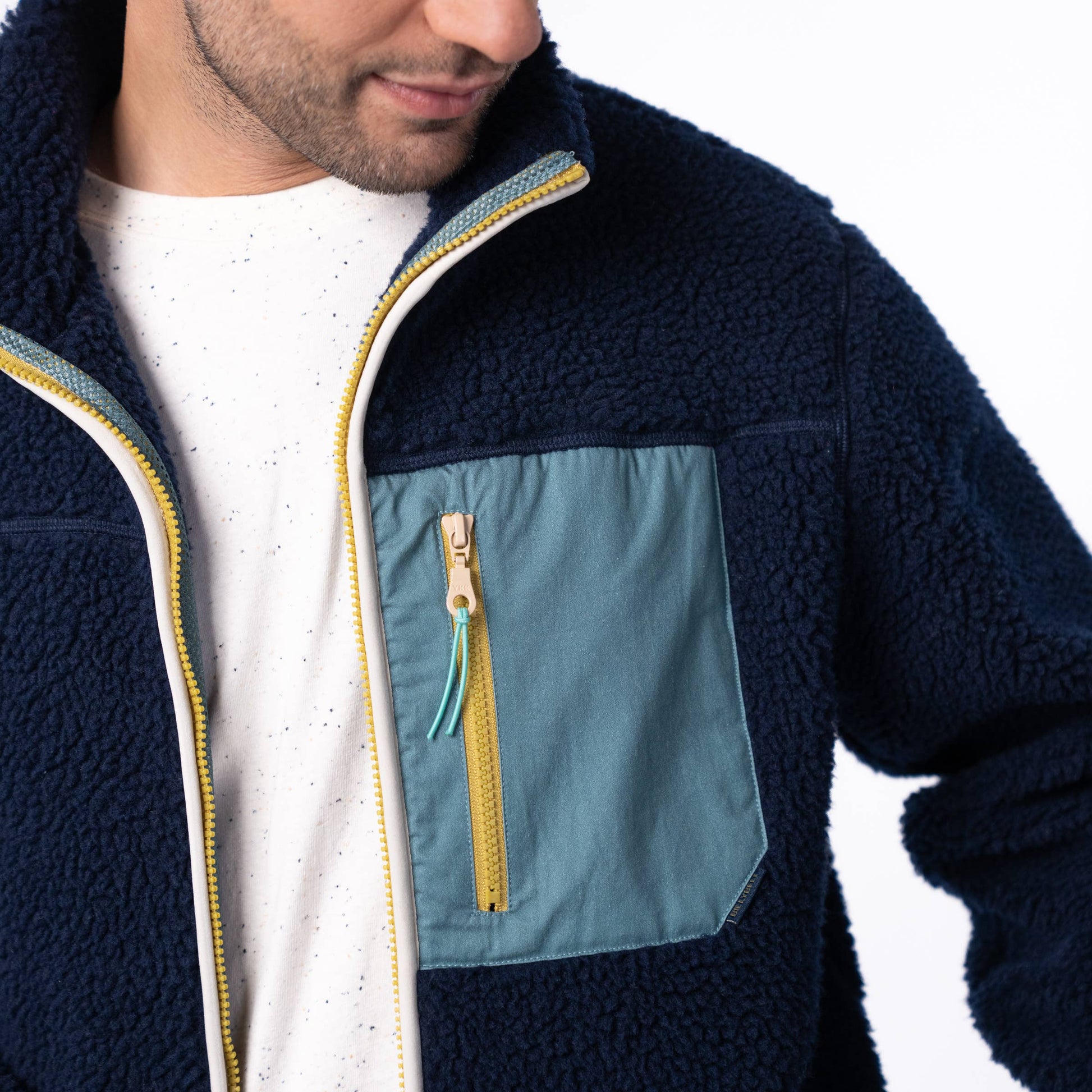 Giacca sherpa unisex con zip bicolore blu navy e verde