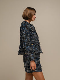 Blazer bouclé corto con bottoni gioiello