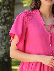 Abito midi fucsia con scollo a V e maniche a volant