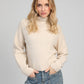 Maglione dolcevita in maglia calda color crema