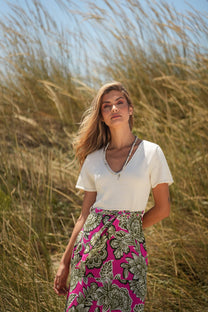 Abito midi con scollo a V e gonna floreale con cintura