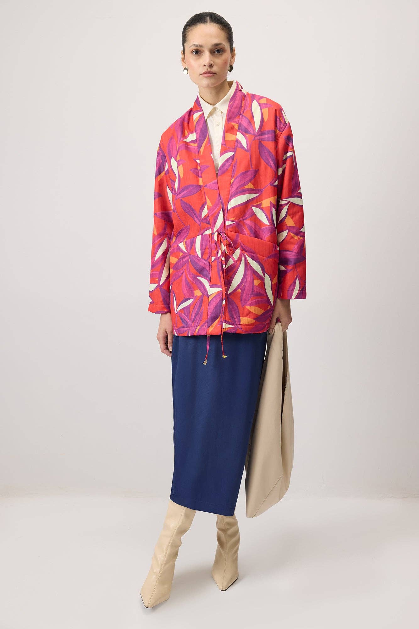 Cappotto fantasia con nodo frontale