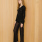 Top a coste con scollo a V in filato glitter