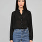 Blusa nera testurizzata con collo alla coreana