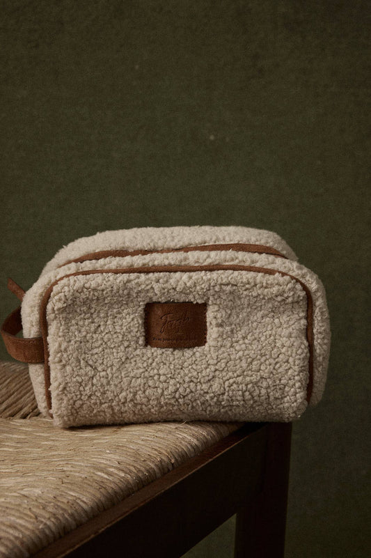 Beauty case da viaggio in sherpa effetto pecora color latte
