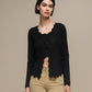Cardigan donna in maglia con scollo a V e bordo ondulato