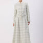 Completo in tweed con giacca corta e gonna lunga