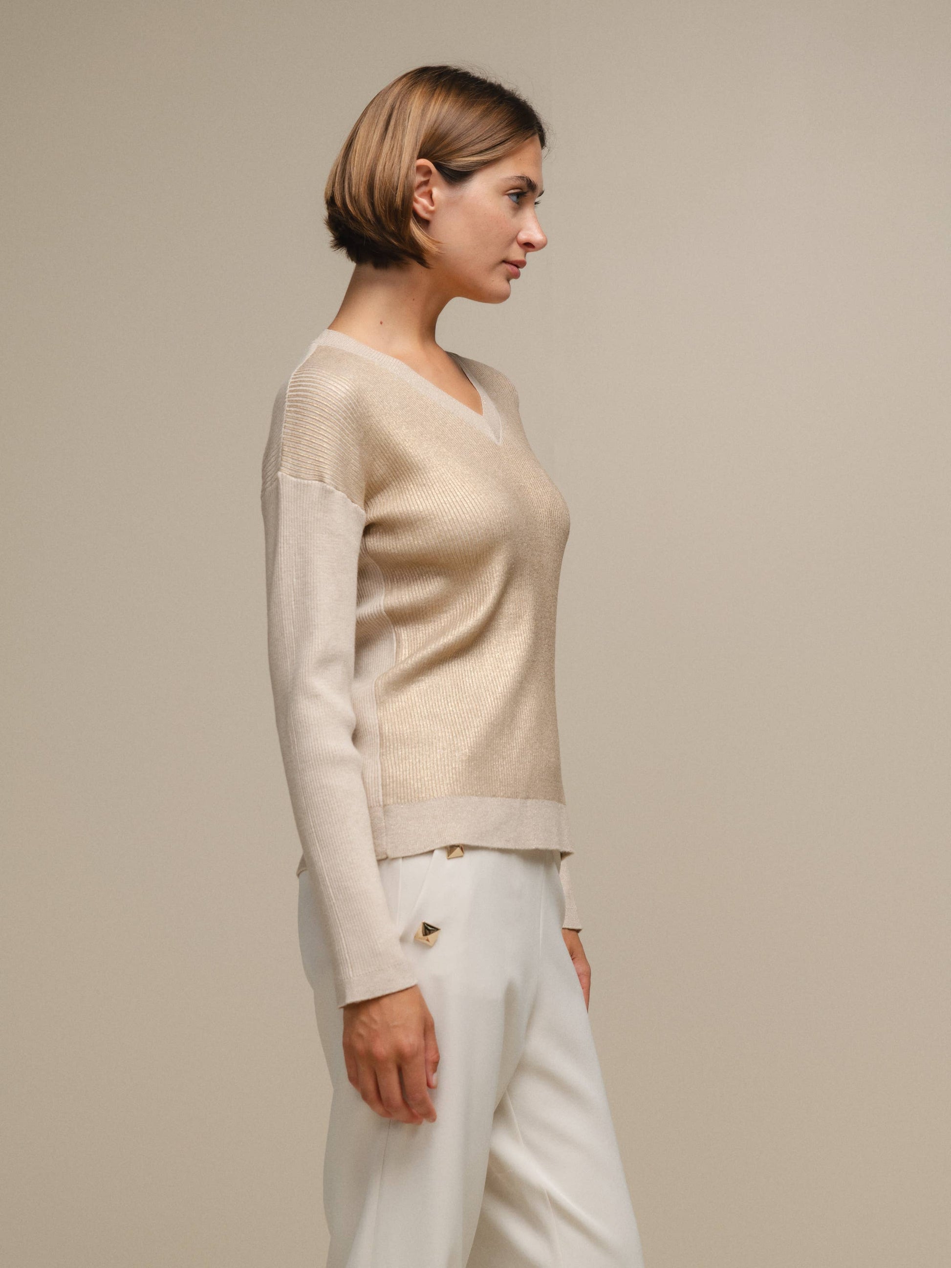 Maglione donna laminato a costine con scollo a V