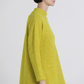 Maglia tunica lunga bouclé con collo alto