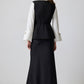 Gilet aderente con bottoni dorati