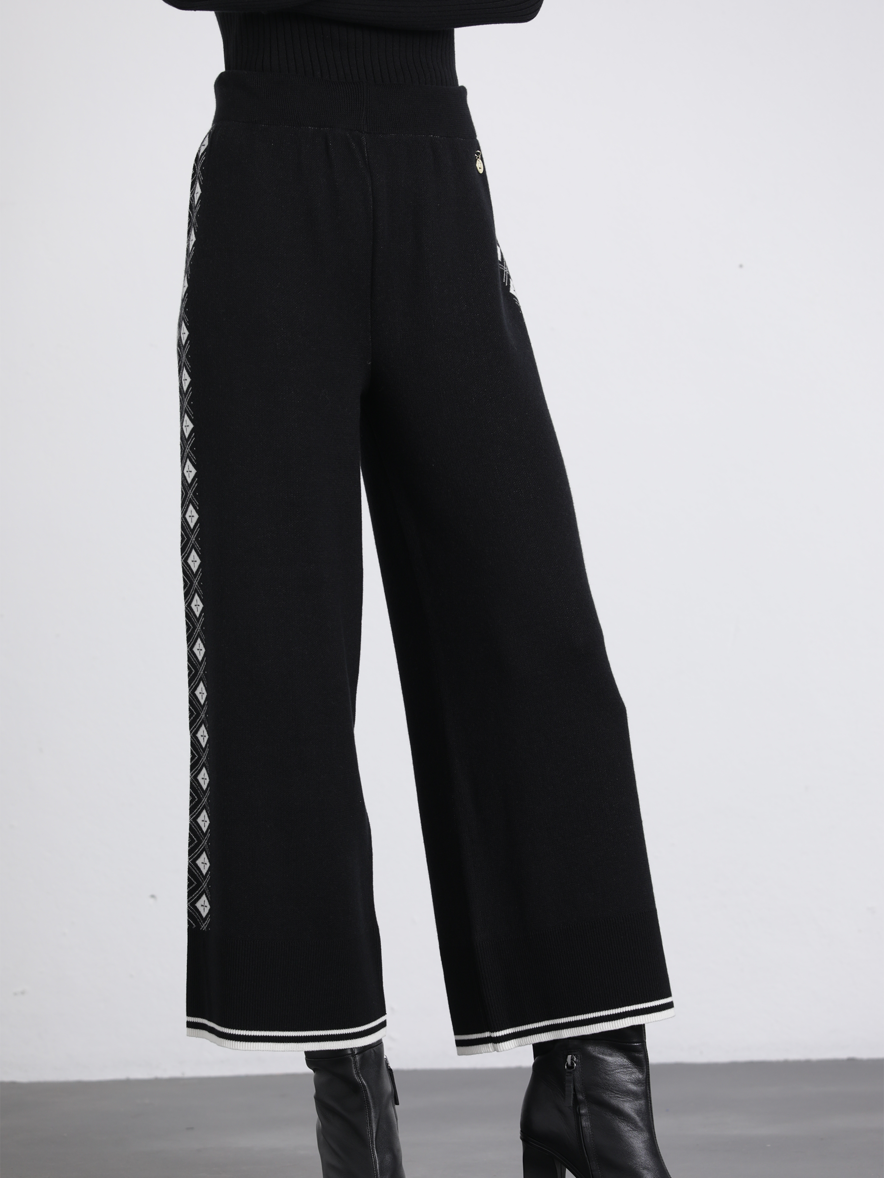 Pantaloni a palazzo jacquard con motivo geometrico