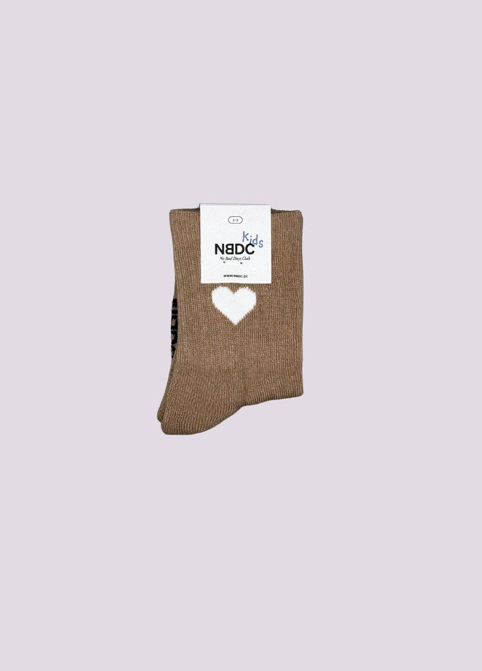 Calzini beige con cuore bianco per bambino
