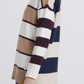 Maglione oversize a righe con collo alto