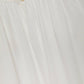 Blusa con pieghe sulle maniche