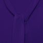 Maglione in maglia rasata con fiocco e scollo a V