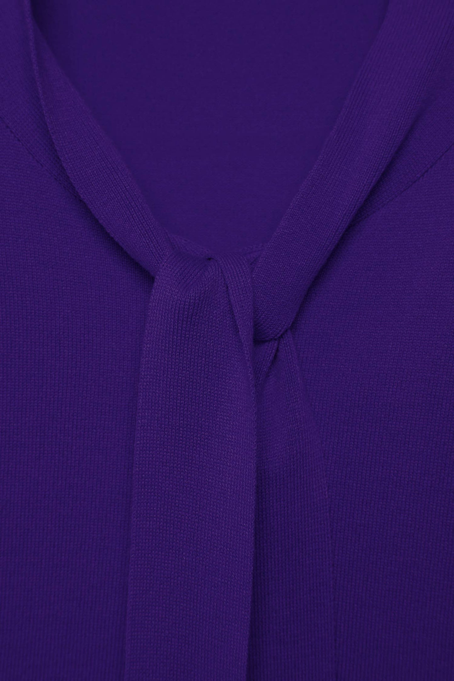 Maglione in maglia rasata con fiocco e scollo a V