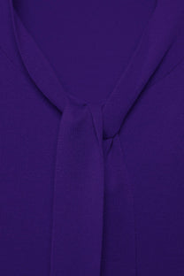 Maglione in maglia rasata con fiocco e scollo a V