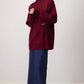 Tunica in maglia oversize con accessorio metallico