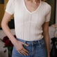 Top in maglia traforata con scollo a V Maki