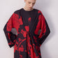 Abito maxi nero con stampa floreale rossa e cintura in vita