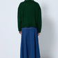 Cardigan in maglia verde con tasche e bottoni
