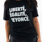 T-shirt con slogan “Liberté, Égalité, Beyoncé” in cotone biologico