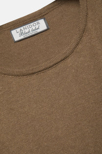 Top smanicato in maglia rasata con girocollo