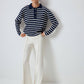 Maglione a righe con scollo a polo