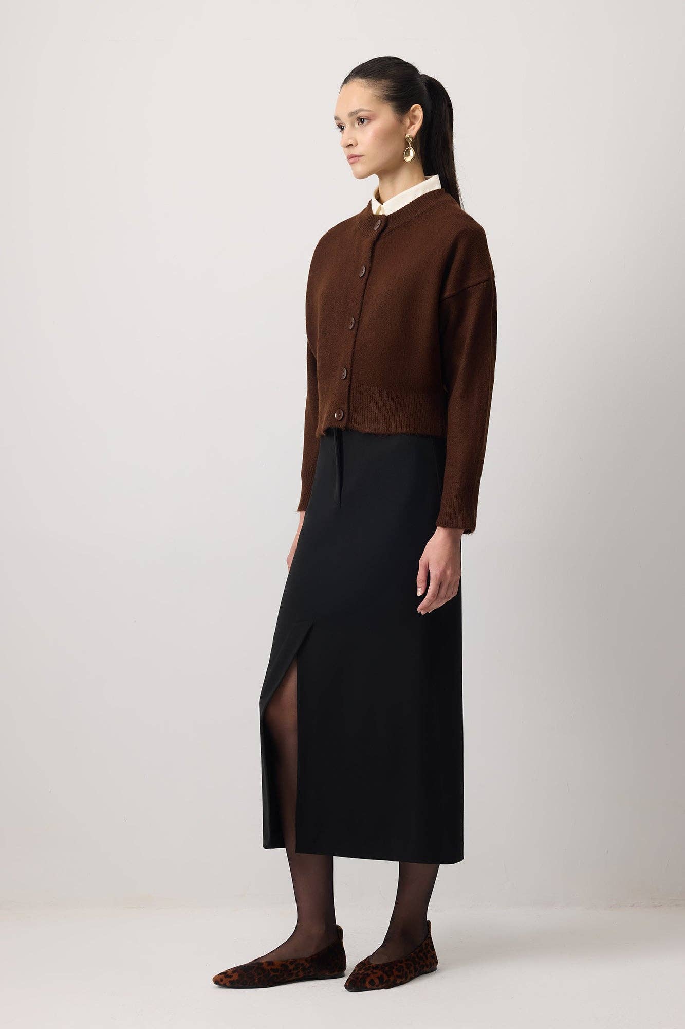 Cardigan corto in maglia con bottoni