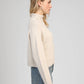 Maglione dolcevita in maglia calda color crema