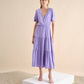 Abito midi in lino con balze e scollo a V