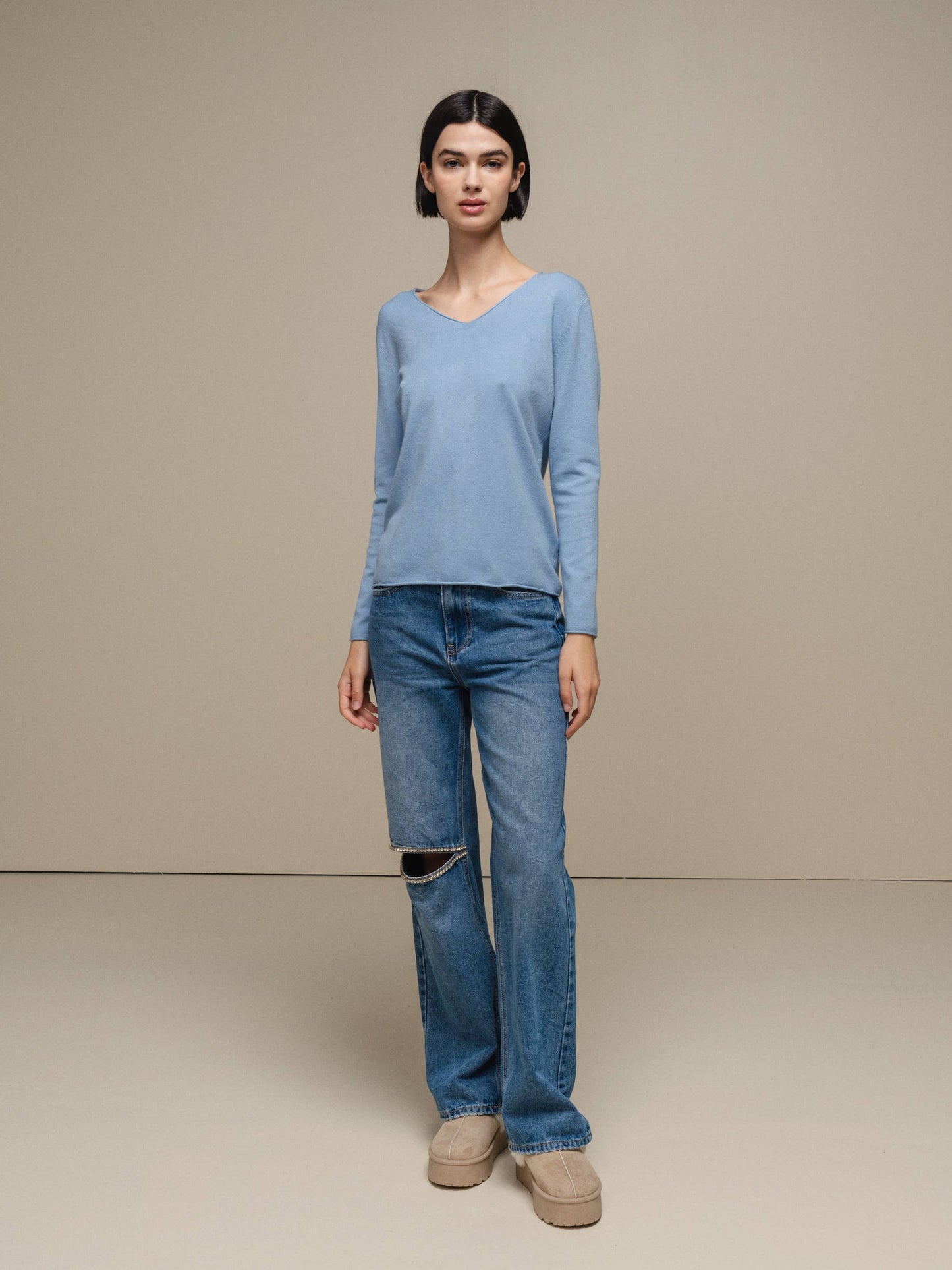 Maglione in maglia da donna con scollo a V