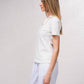 T-shirt basic aderente con catena dorata