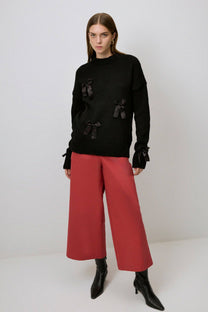 Maglione in maglia con fiocchi