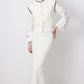 Set in maglia gilet e gonna longuette ecru con bottoni gioiello