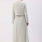 Completo in tweed con giacca corta e gonna lunga