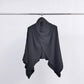 Poncho a coste asimmetrico in maglia morbida