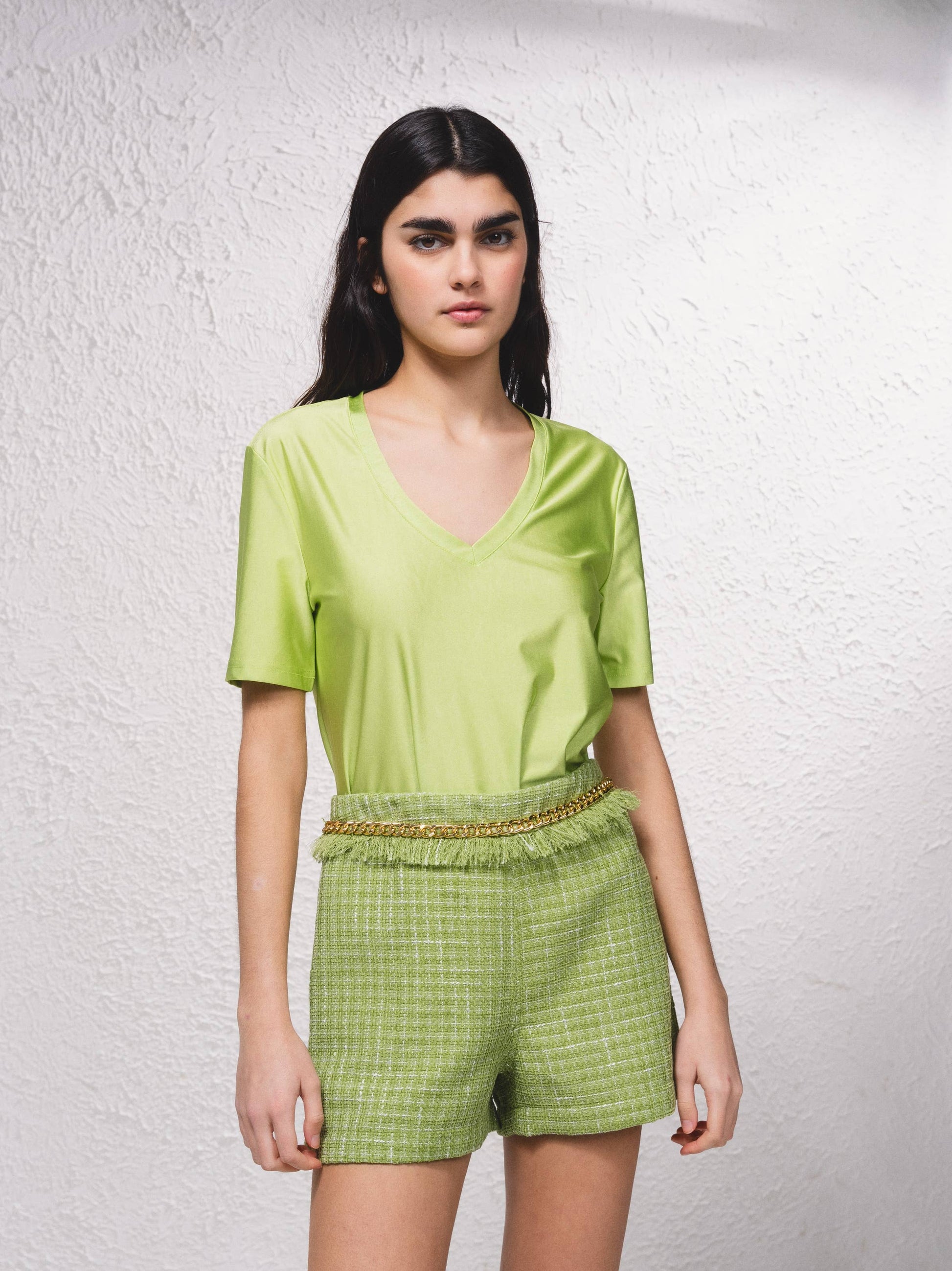 Shorts effetto tweed con catena
