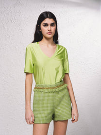 Shorts effetto tweed con catena