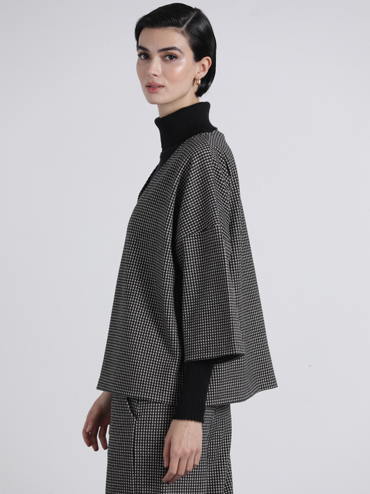 Felpa in maglia a micro quadretti con scollo a V