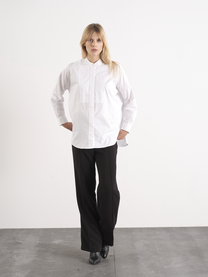 Camicia bianca in cotone con bottone a cuore